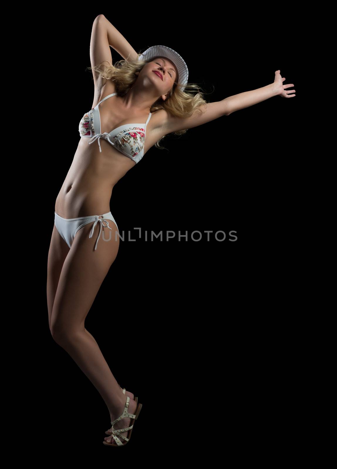 woman in bikini and hat dancing by adam121