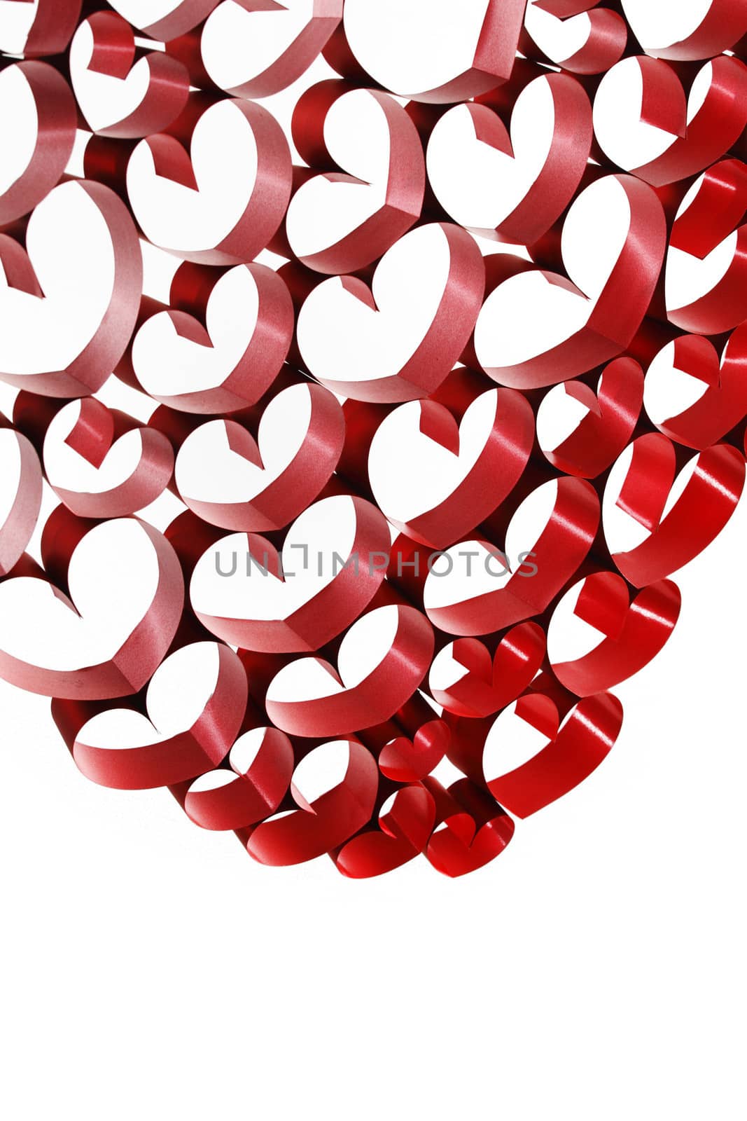 Red ribbon hearts decoration on white background