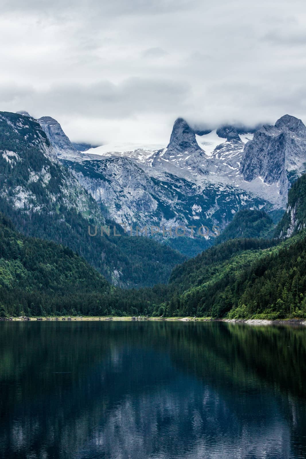 Lake and mountains view in high Alps