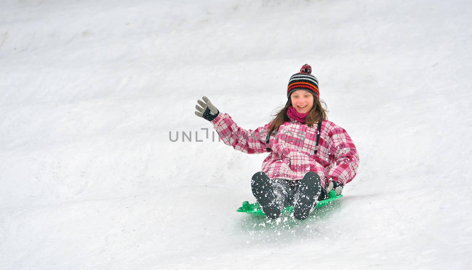 girl sliding on sled  by mady70