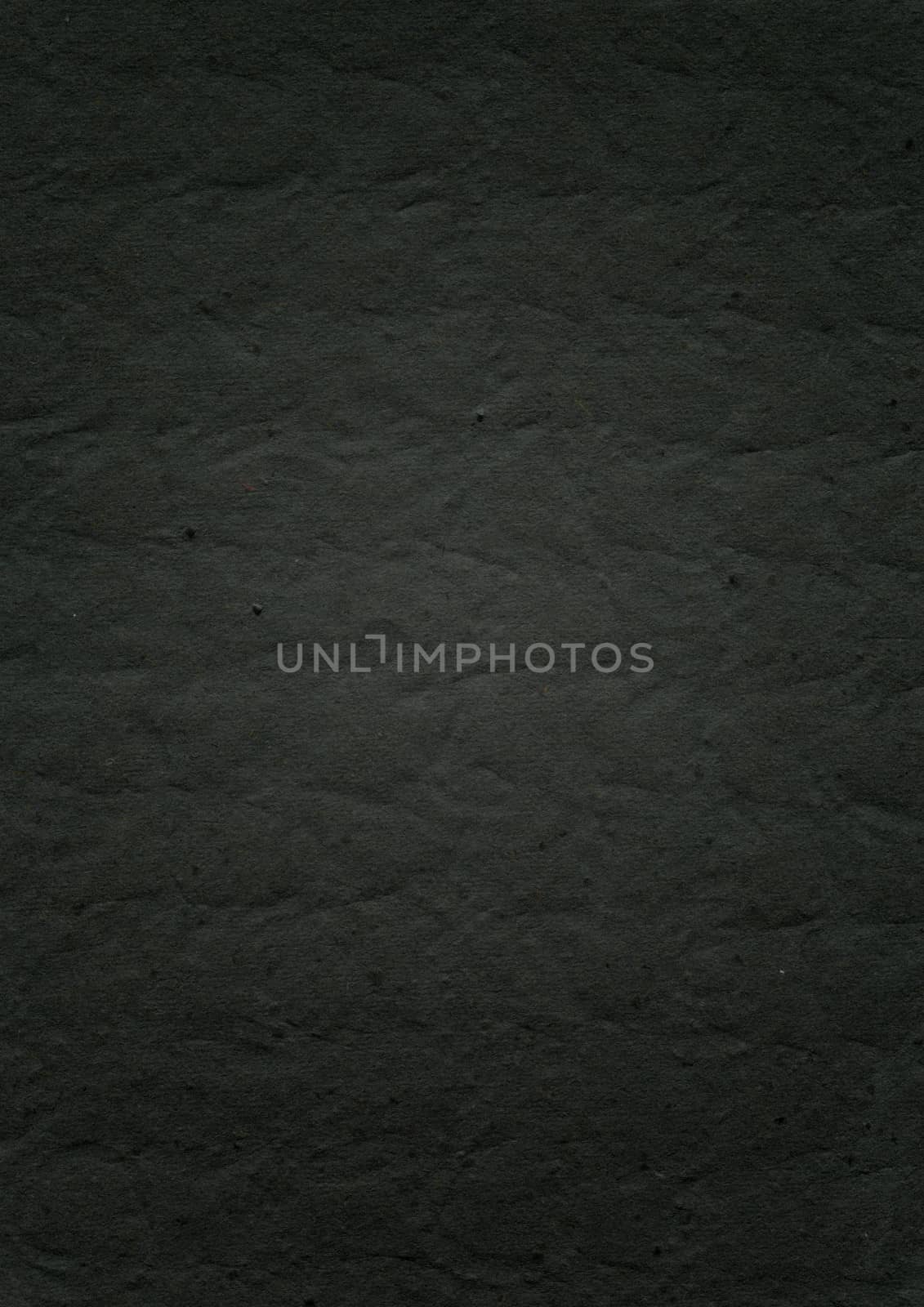 embossed black paper texture background by daboost