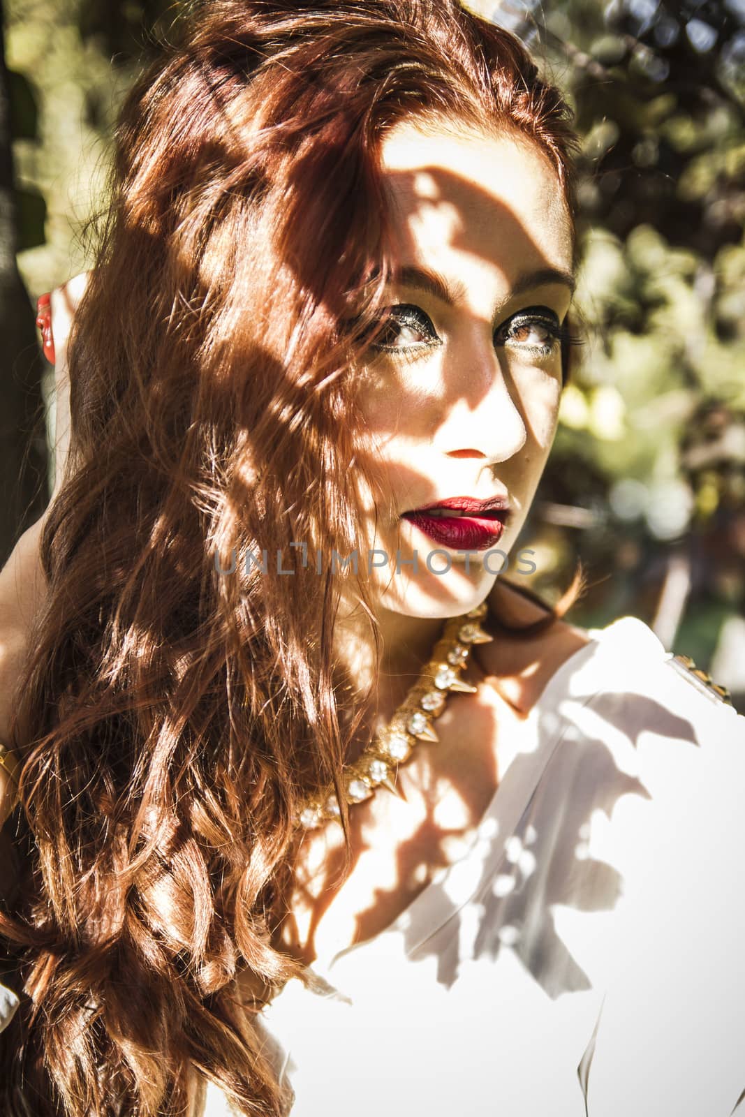 Teen in spring or summer forest park full of hope and vitality. by FernandoCortes