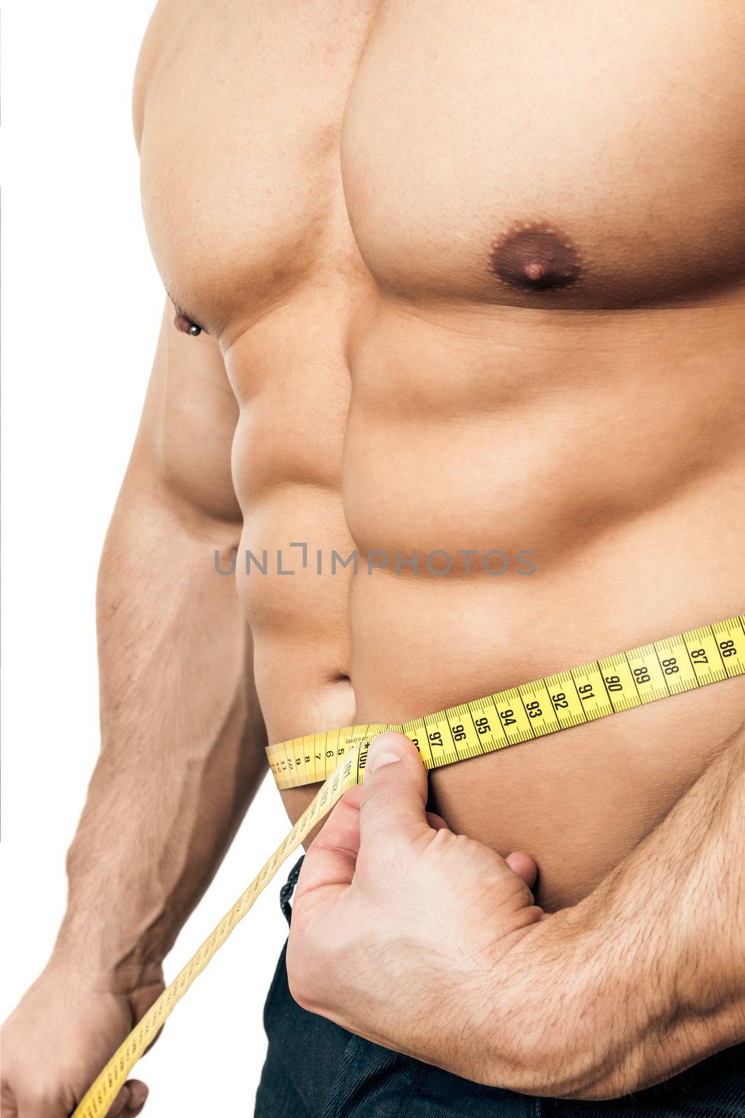 An image of a handsome young muscular sports man measure