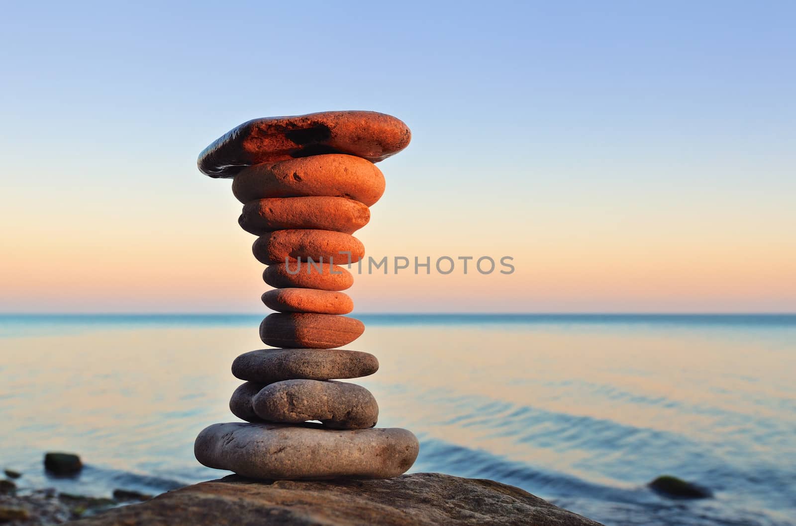 Pyramidal stack of pebbles on the seacoast