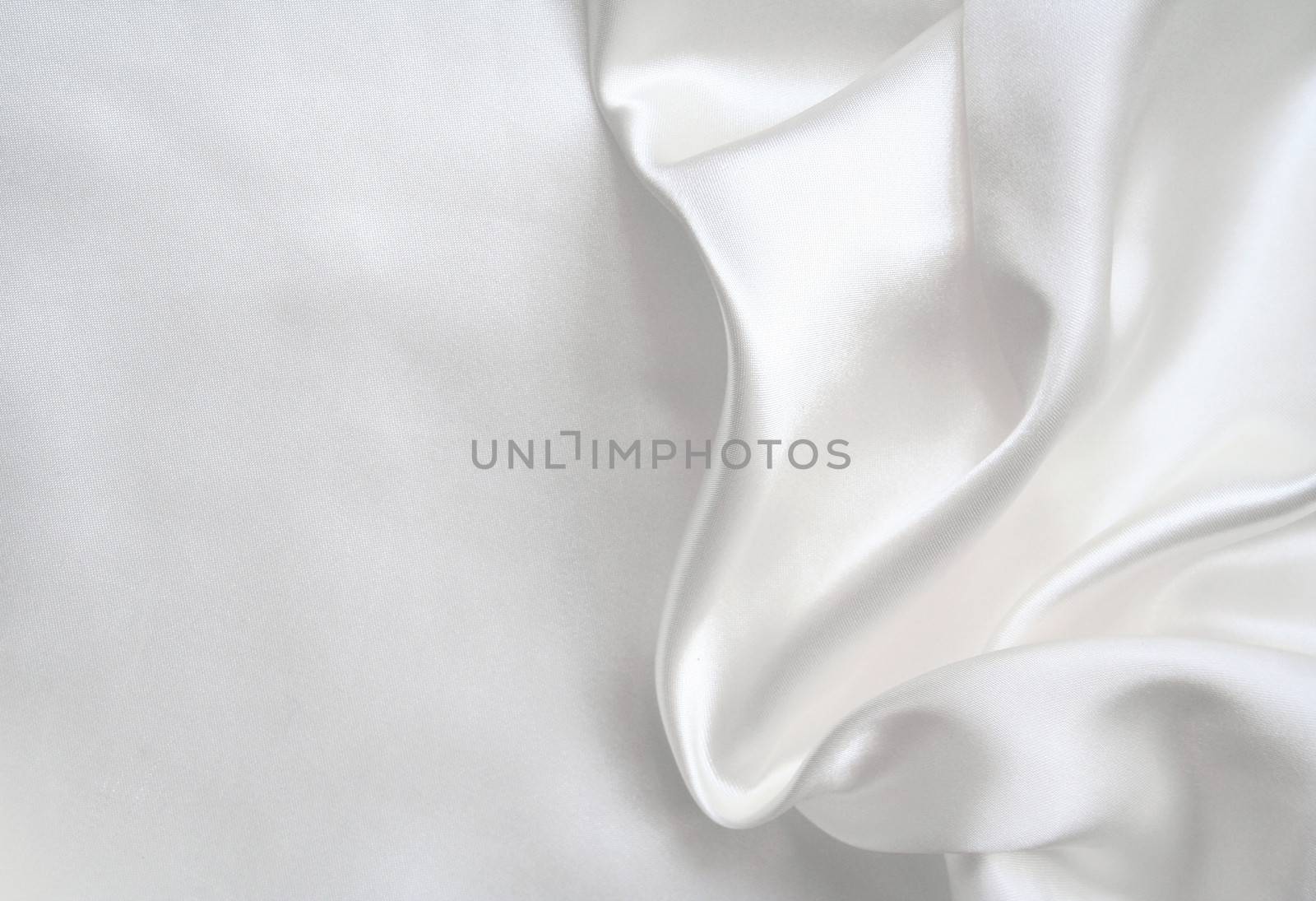 Smooth elegant white silk can use as wedding background 
