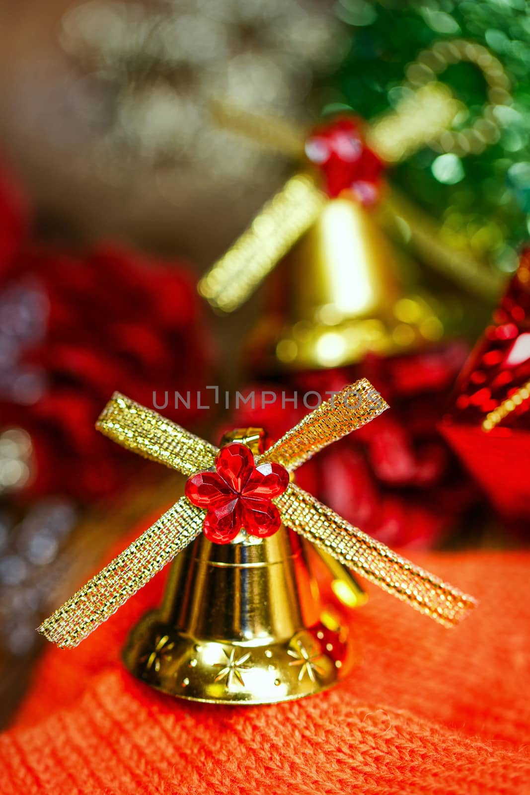 Festive Christmas golden bells photographed close-up background