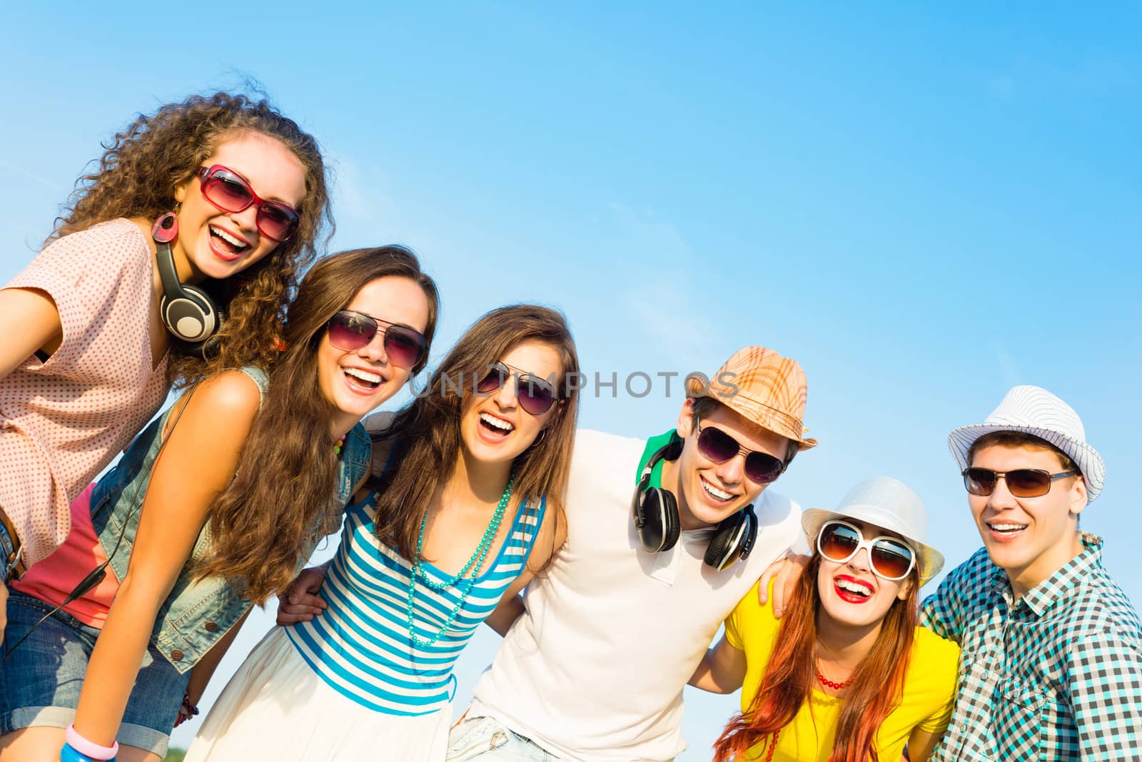 group of young people wearing sunglasses and hat by adam121