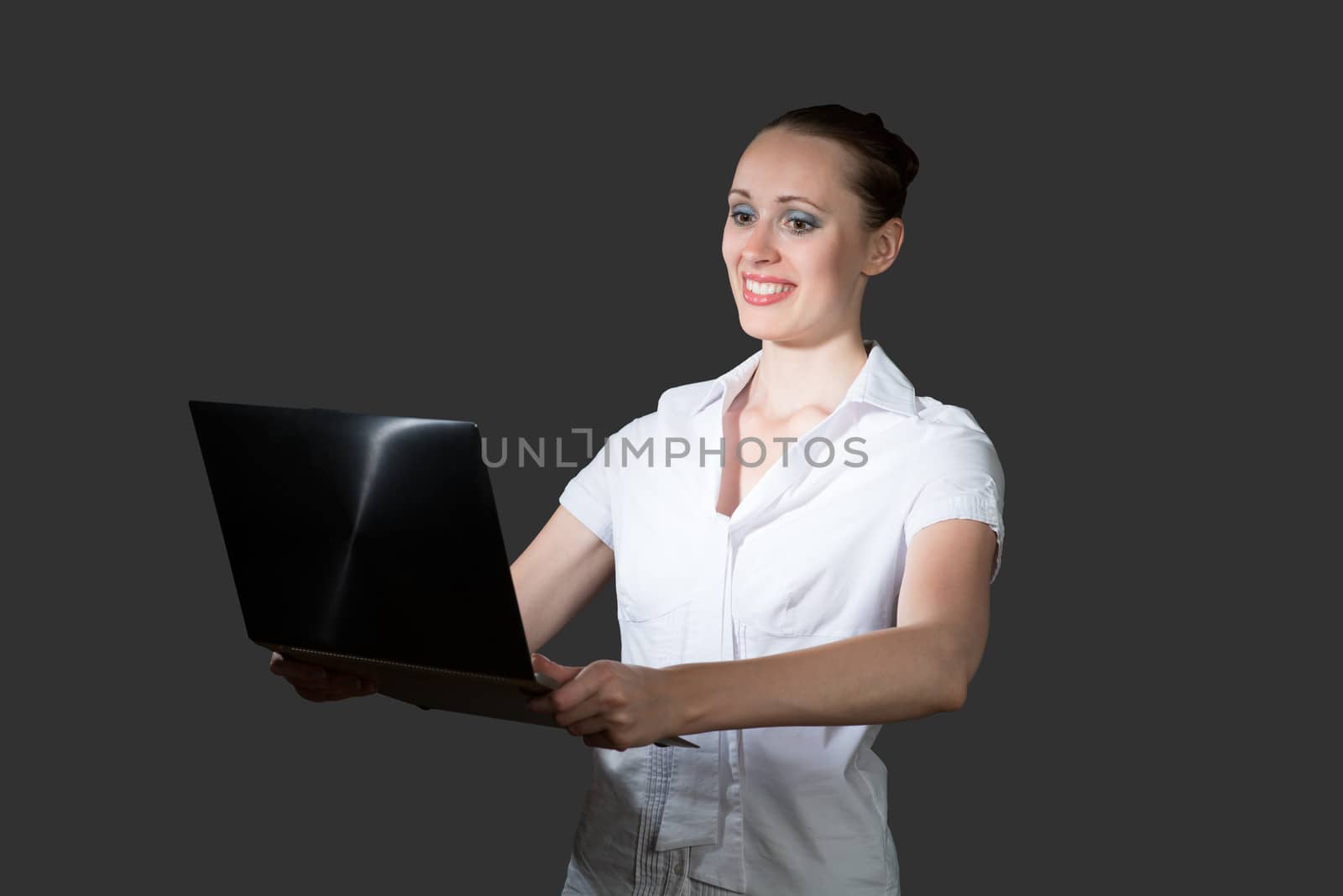business woman holding a laptop by adam121