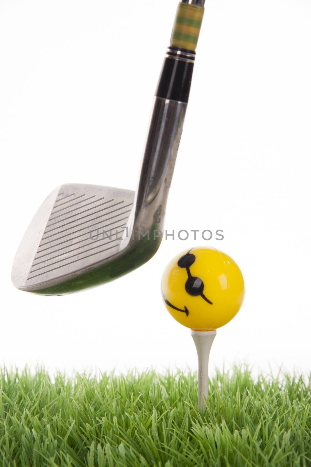 Golf scene on a tee in the photo studio

