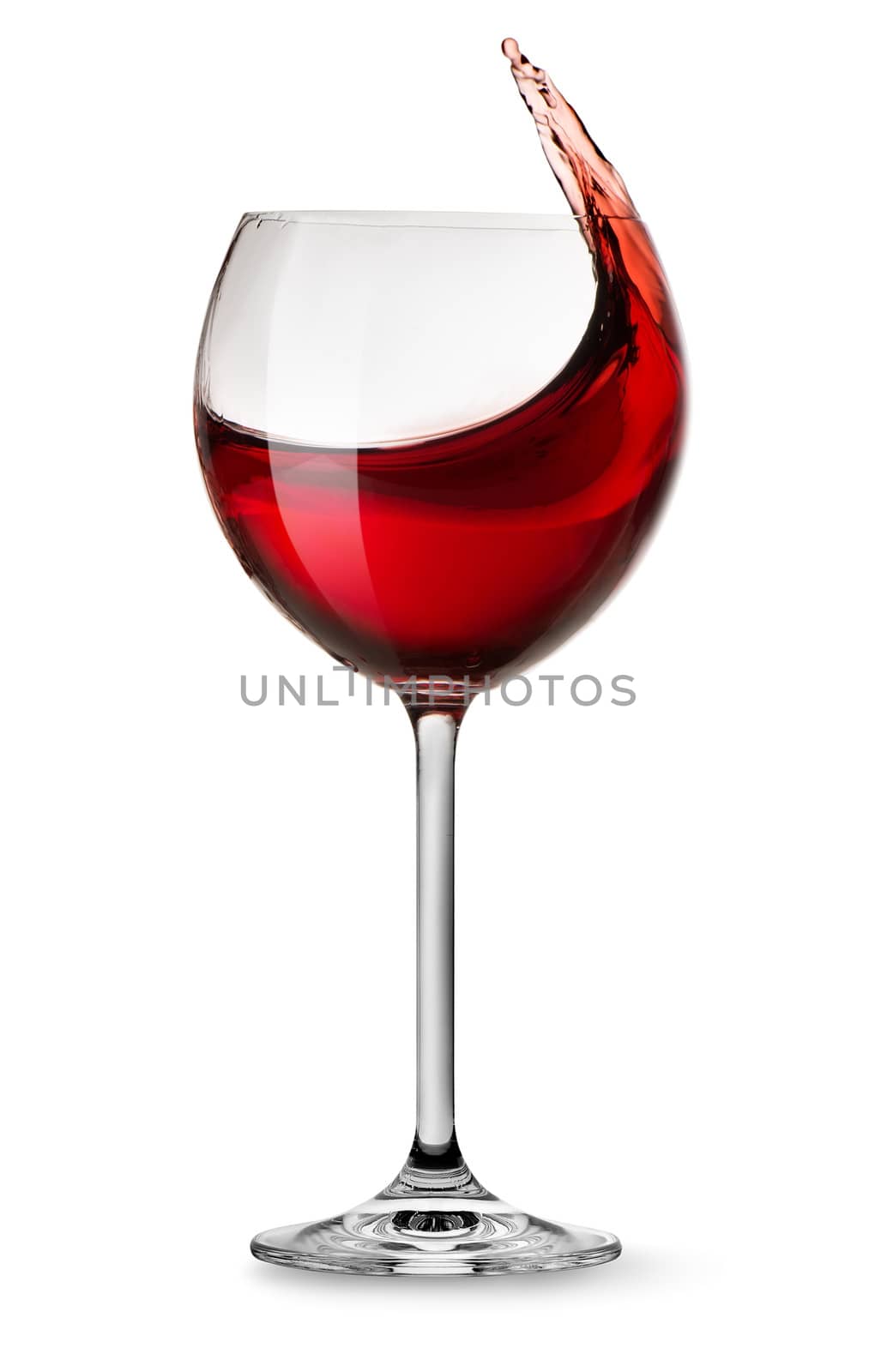 Moving red wine glass over a white background