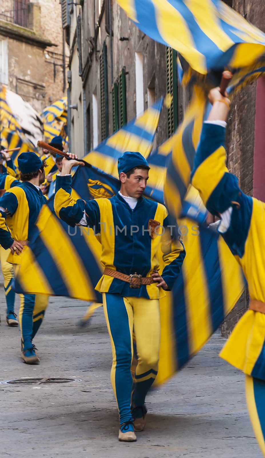 flag-flyers before the Palio in Siena, Italy