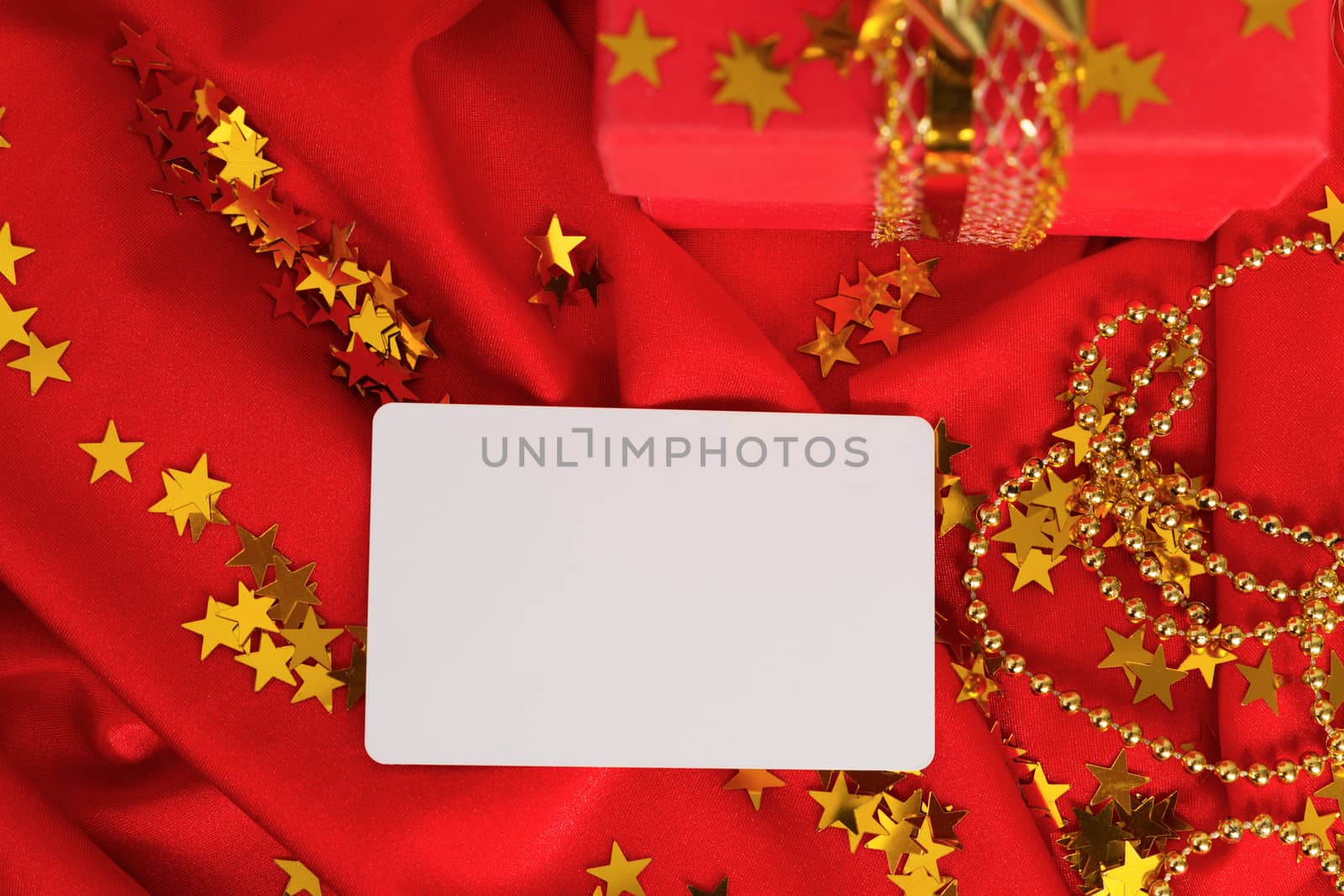 A Red gift with the visiting card