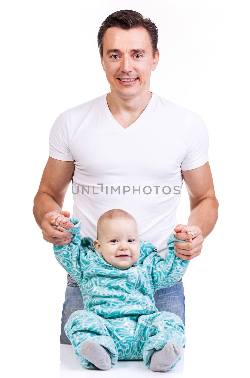 Young Caucasian father with baby son over white by photobac