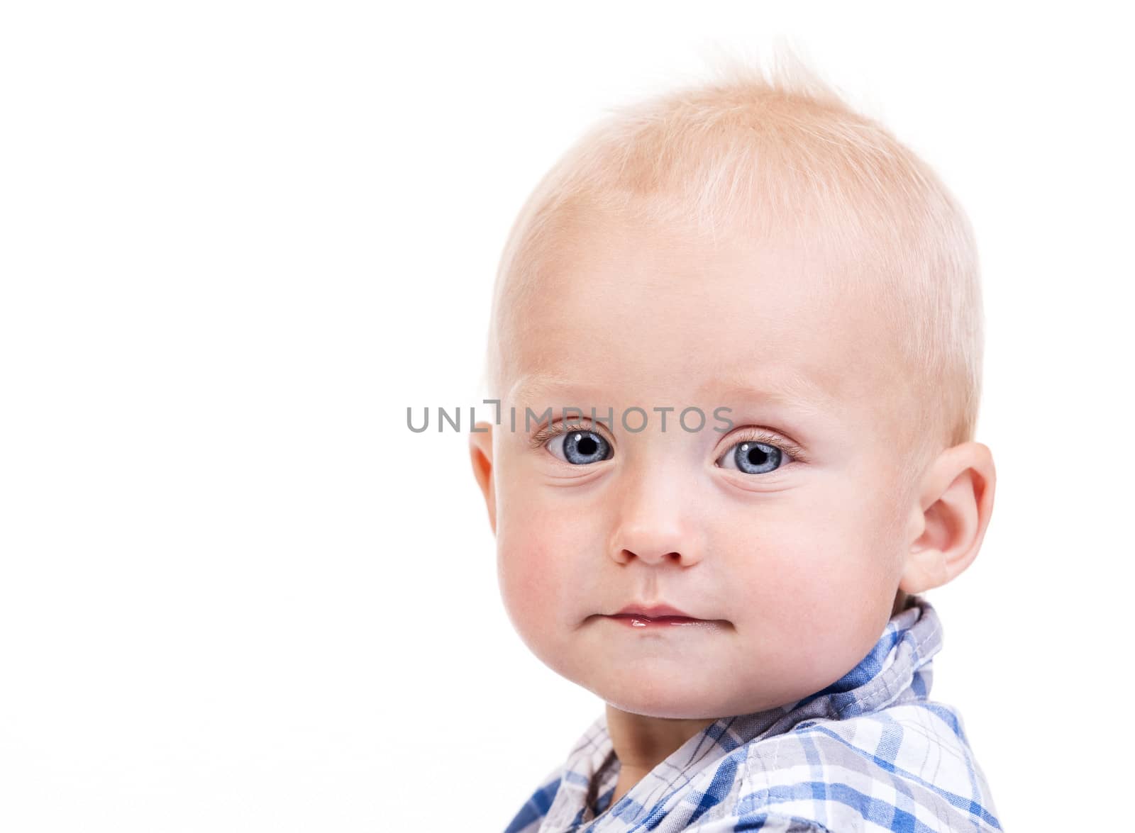 Closeup of a nine-month old boy over white by photobac