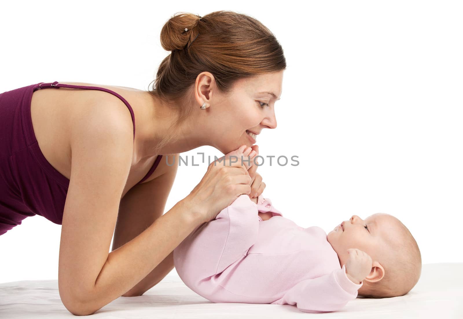 Young beautiful mother and newborn baby boy by photobac