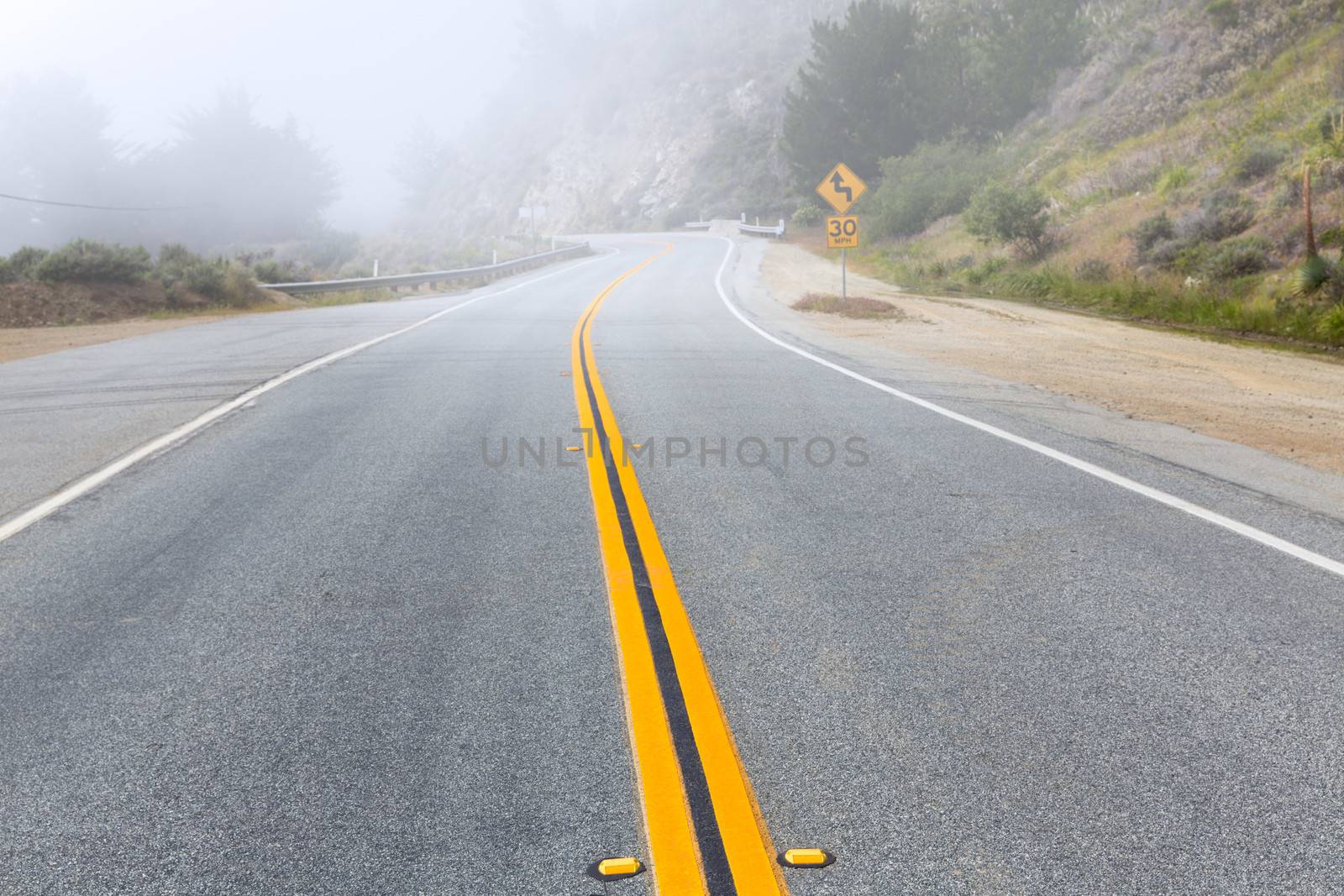 Foggy road in Calfornia Pacific Highway 1 US 101 by lunamarina