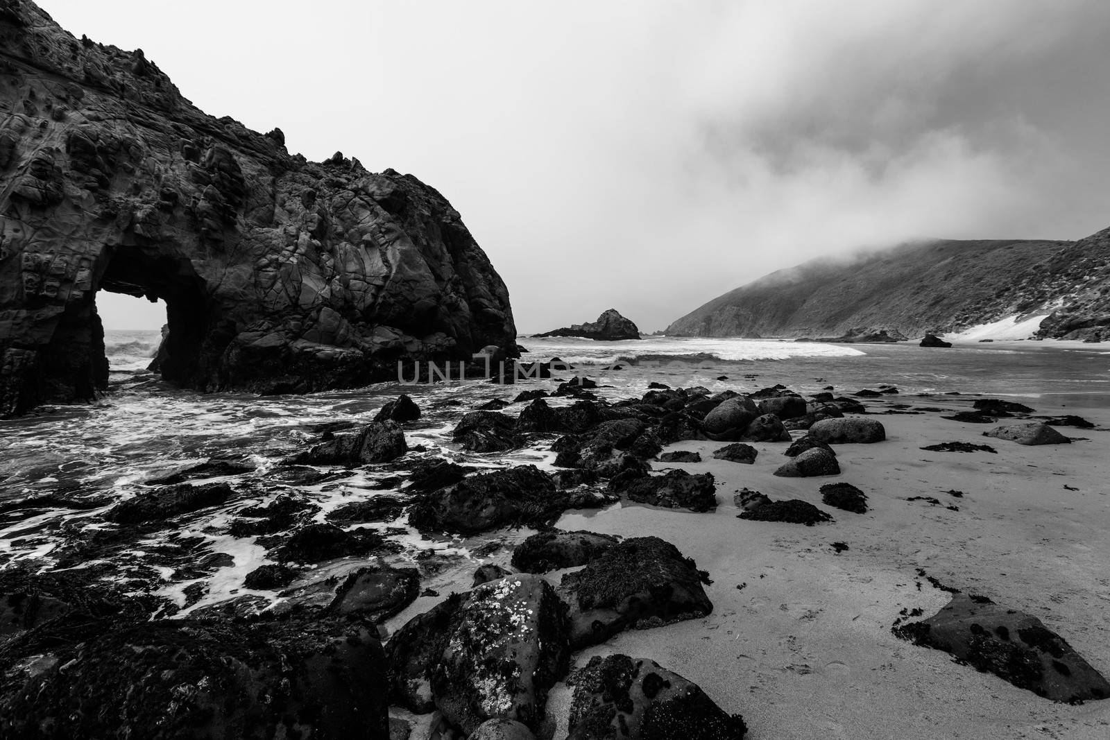 California Pfeiffer Beach in Big Sur State Park dramatic black and white rocks and waves