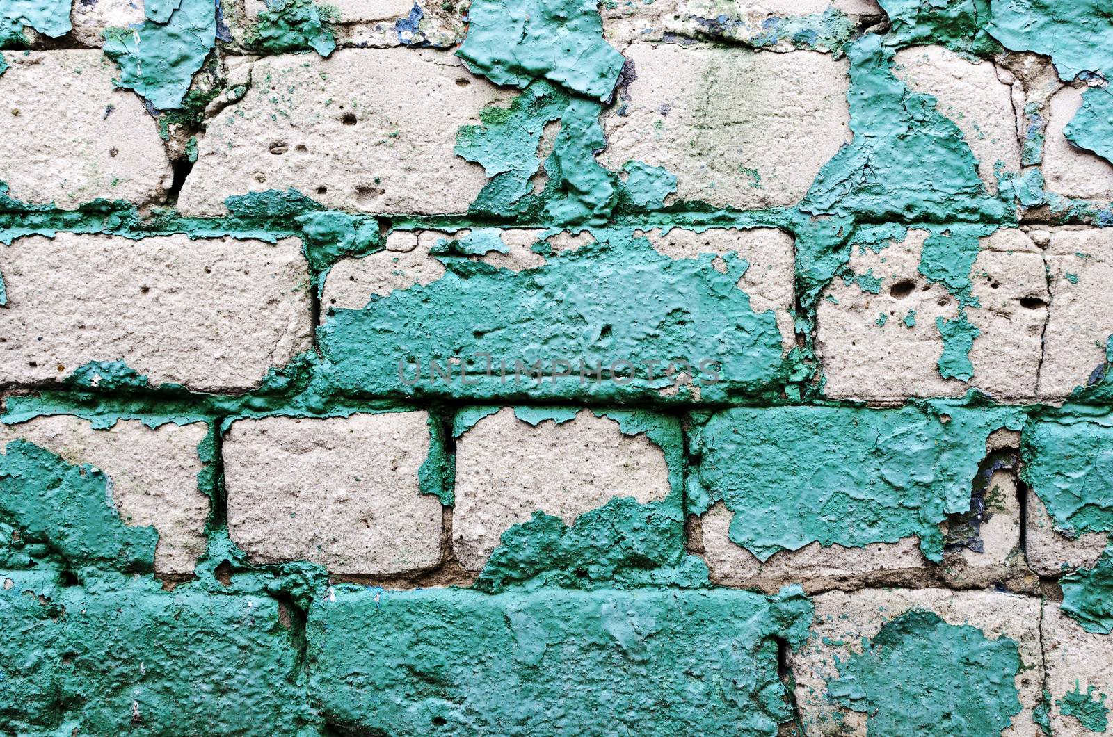 old brick wall texture background with worn off paint