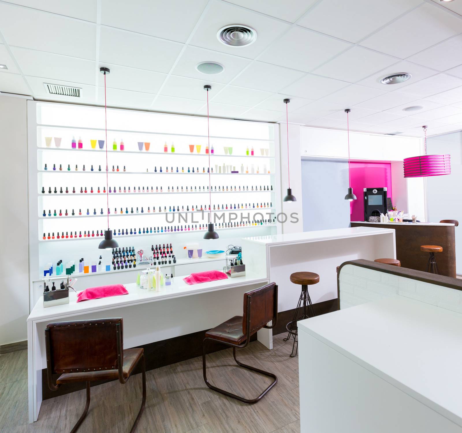 Nail and pedicure saloon modern with nail polish colorful in a row on white background