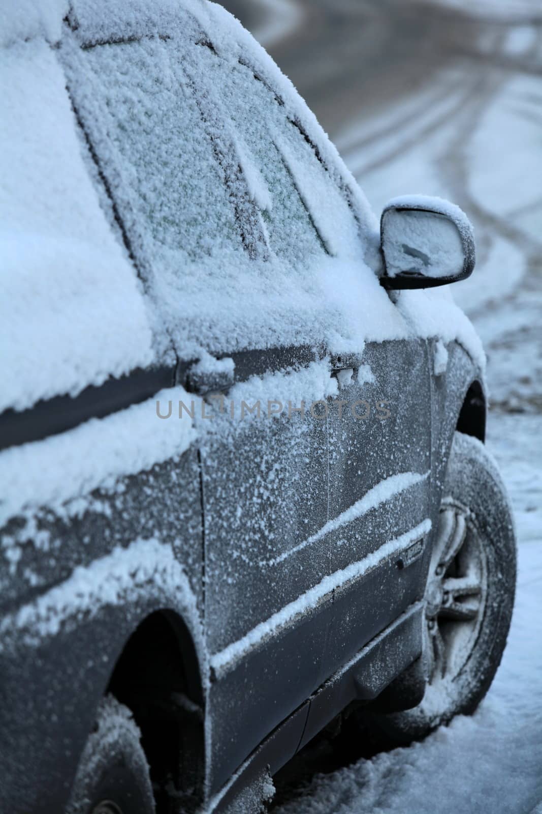 Snow and ice over the car