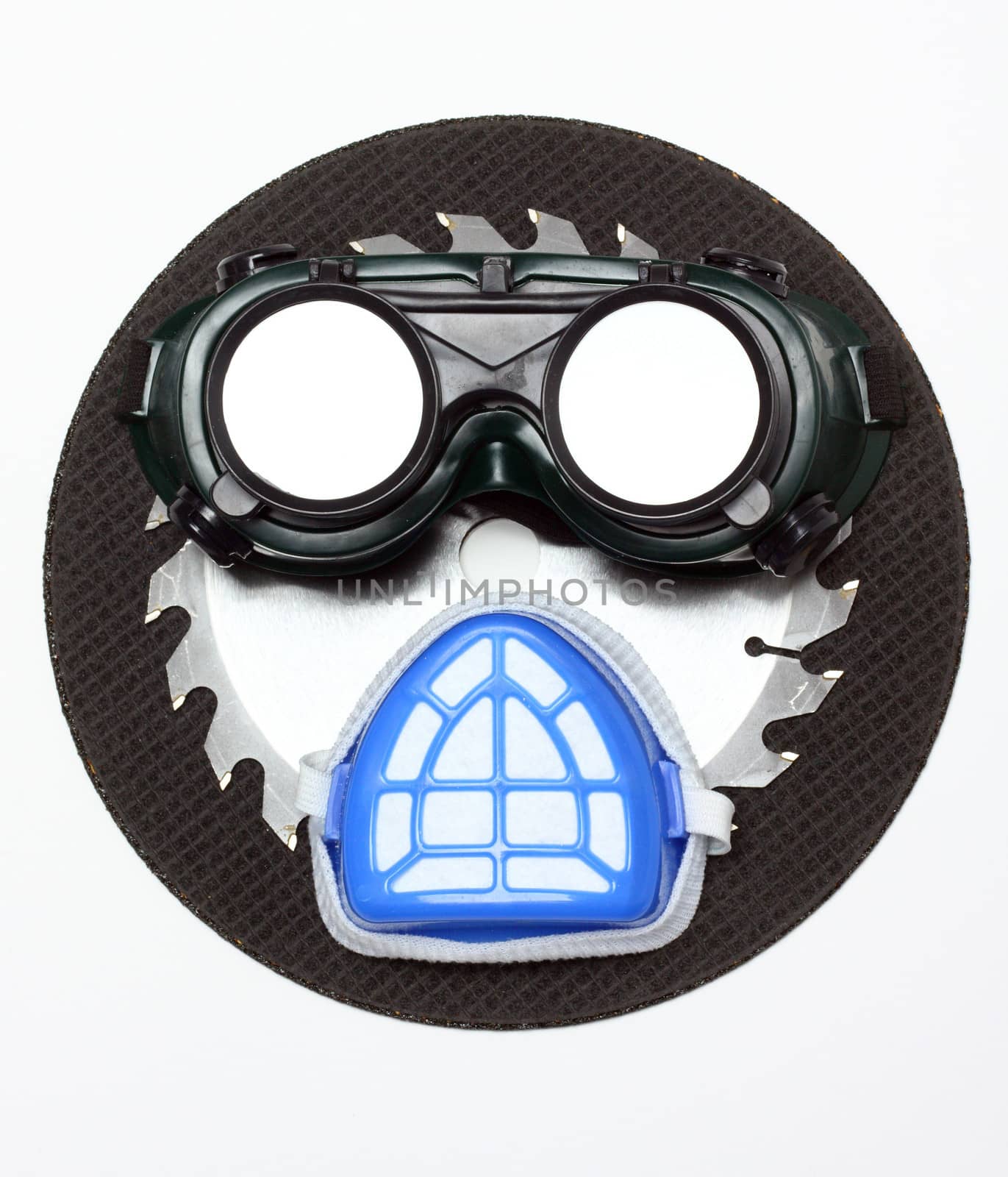 goggles and a mask as a human face. safety concept