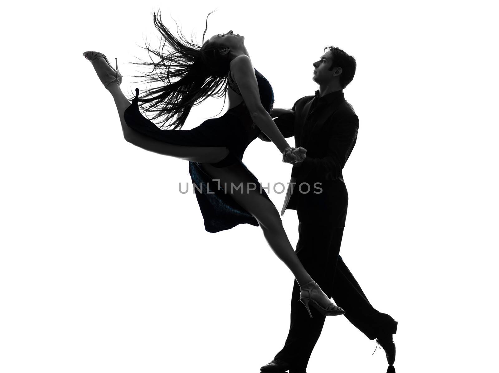 one caucasian couple man woman ballroom dancers tangoing in silhouette studio isolated on white background