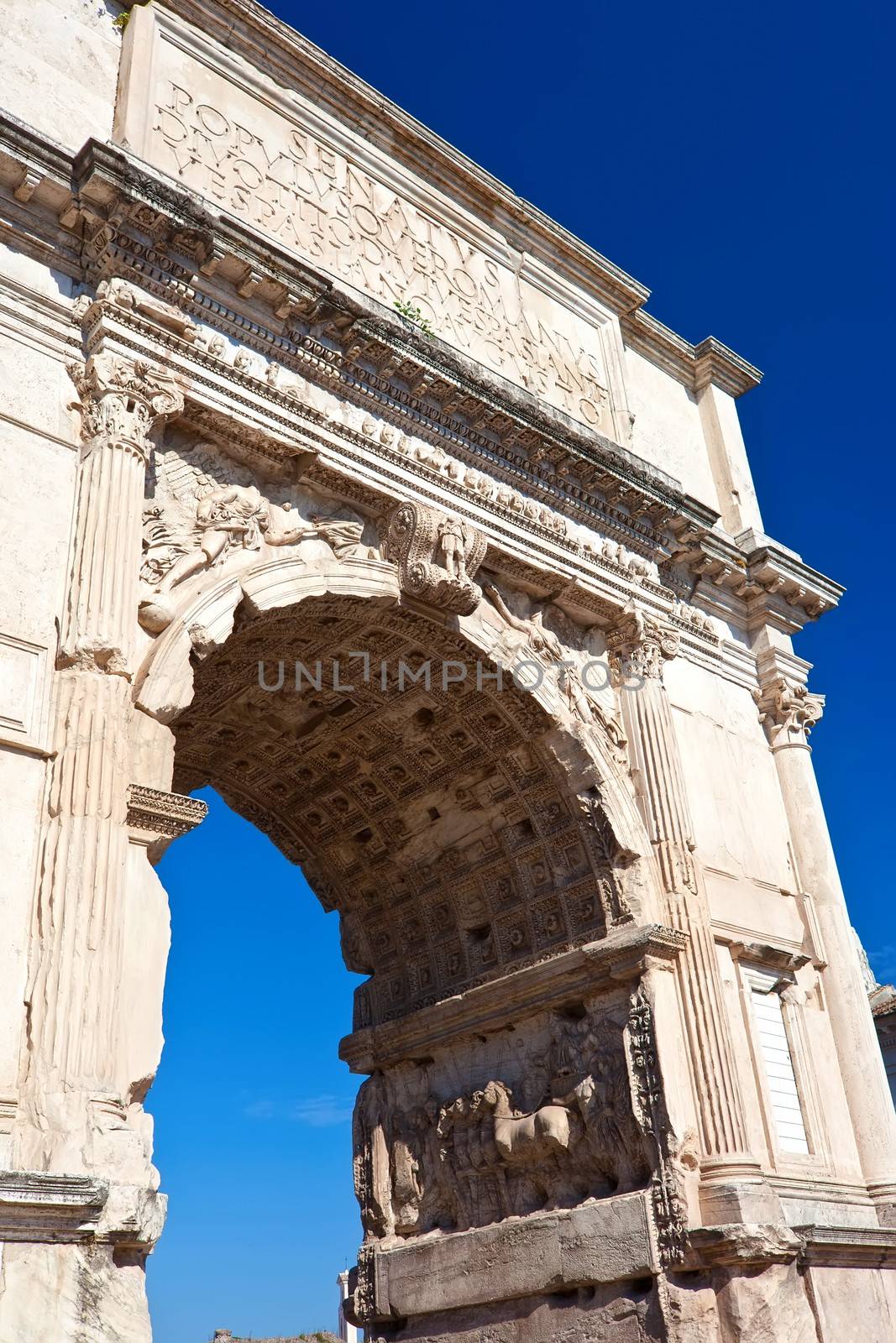 Arch of Titus in famous ancient Roman Forum, Rome, Italy