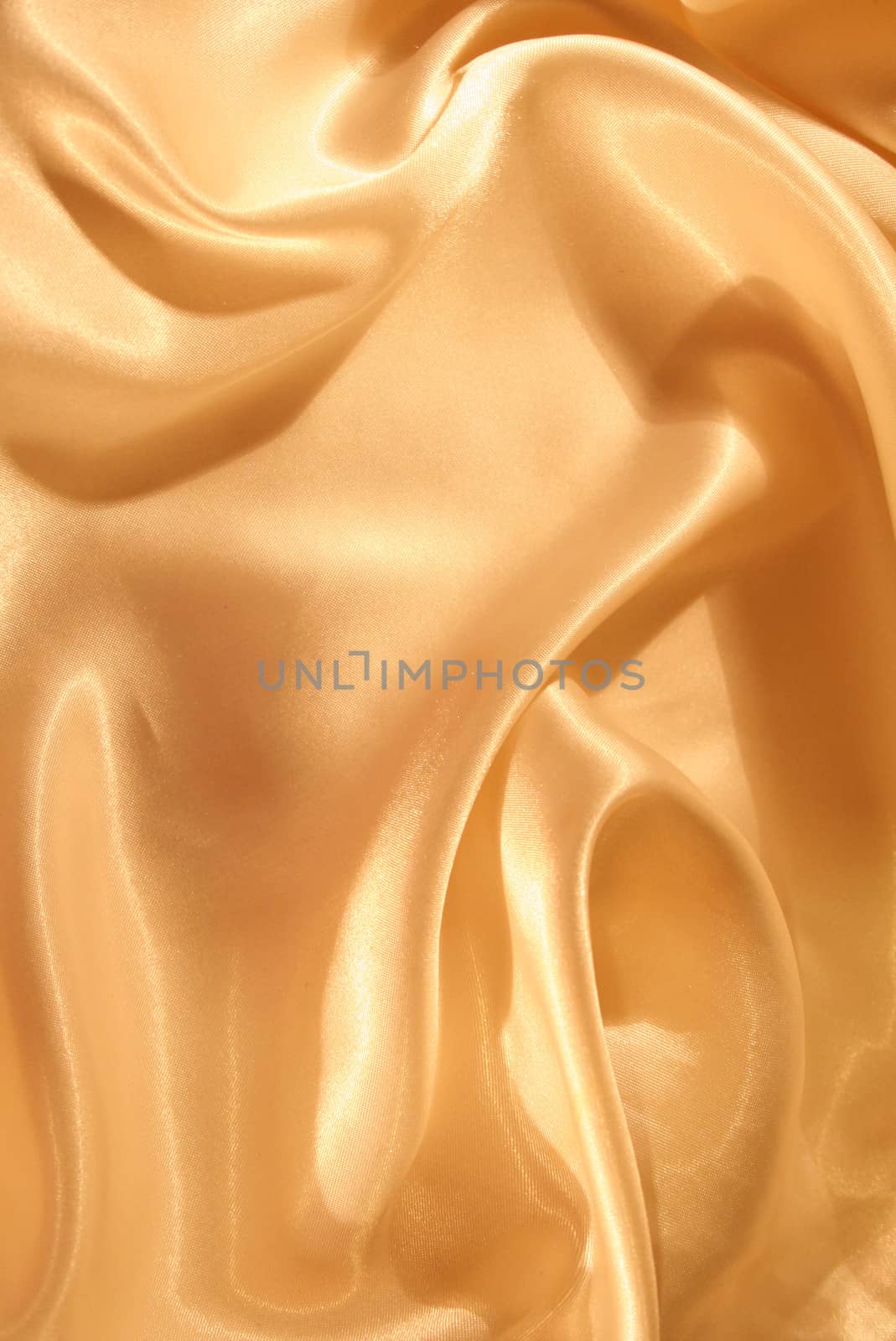 Smooth elegant golden silk can use as background 