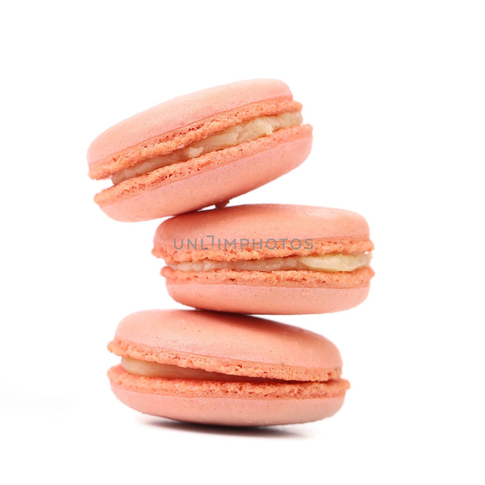 Stack of pink macarons.  Isolated on white background