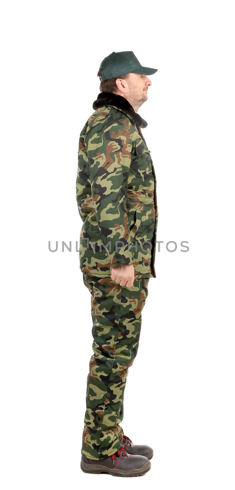 Man in military vest. Side view. Isolated on a white background.