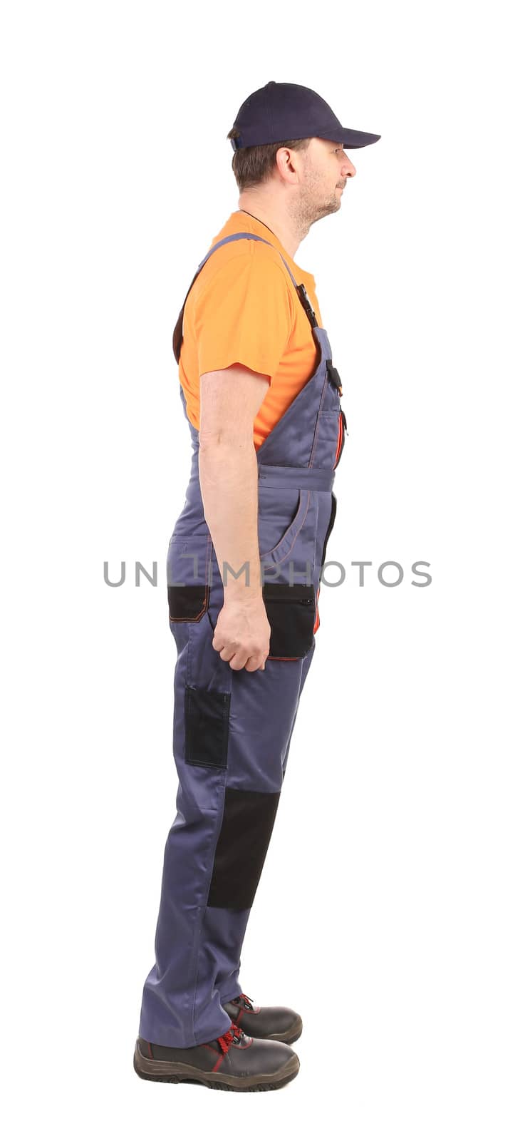 Worker wearing overalls. Isolated on a white background.