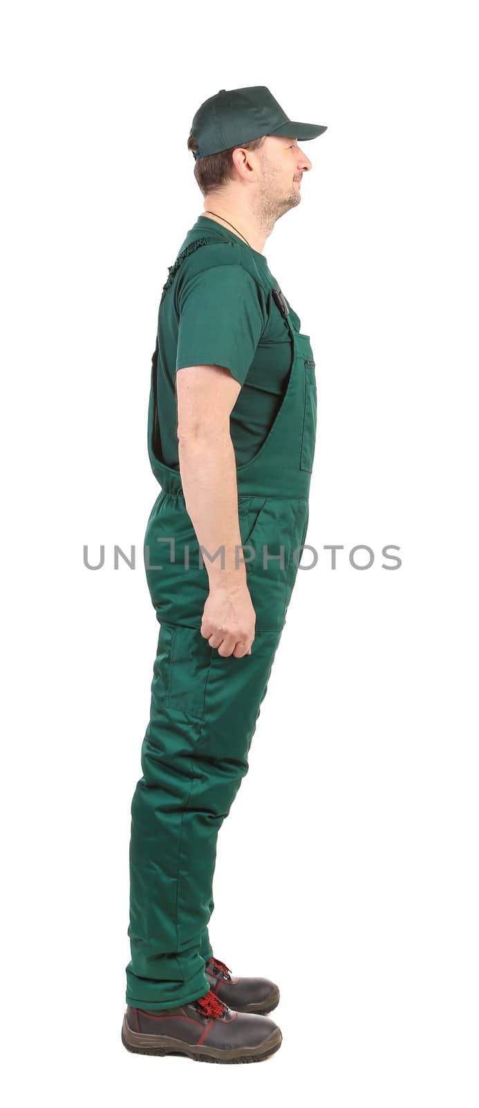 Man in green  overalls on a white background