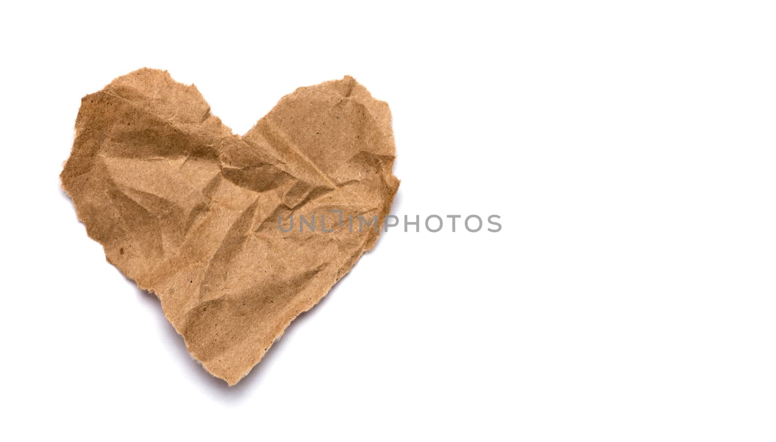 Torn paper heart on a white background