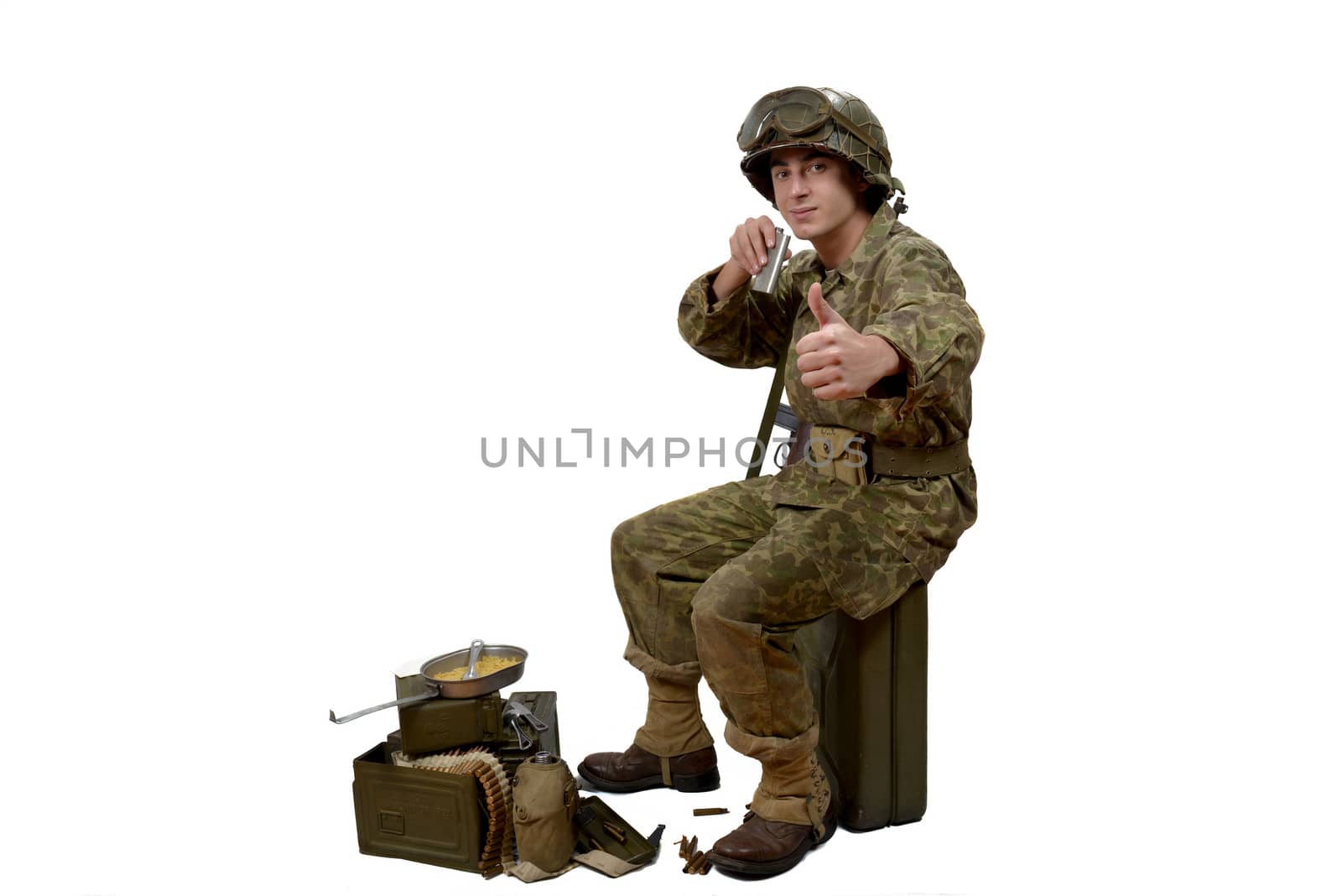 young American soldier in camouflage uniform is ready