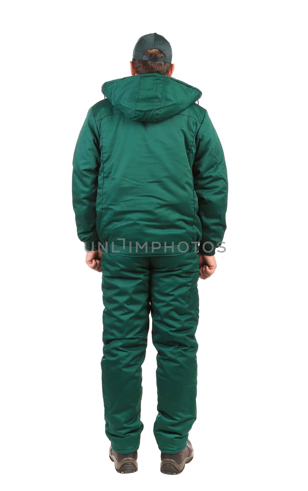 Worker in green overalls. Isolated on a white background.