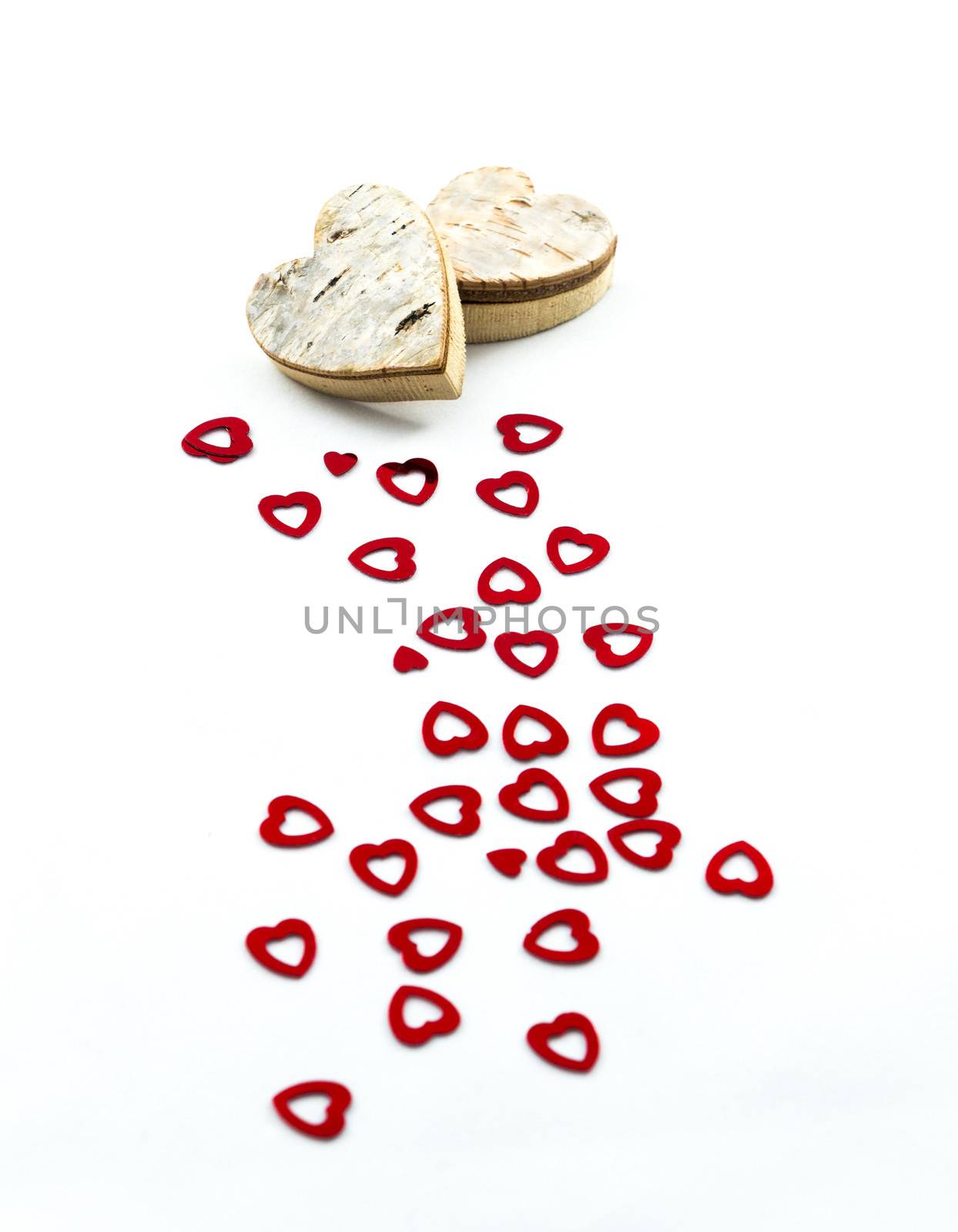 Red hearts and wooden hearts for Valentines day and love concept