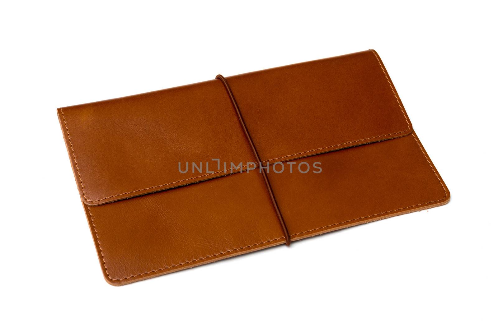 Brown leather clutch bag on a white background