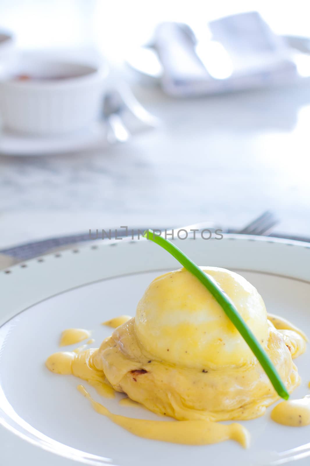 high key image of eggs benedict for breakfast