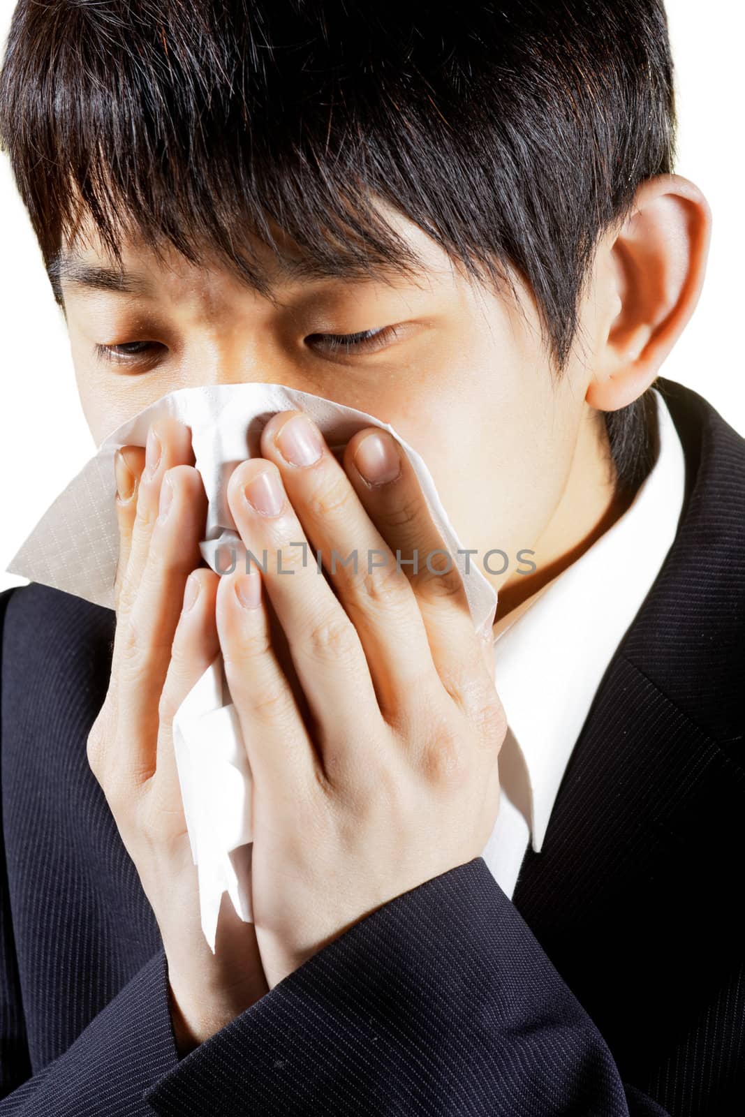 Young Man Blowing Nose into a tissue  by cozyta