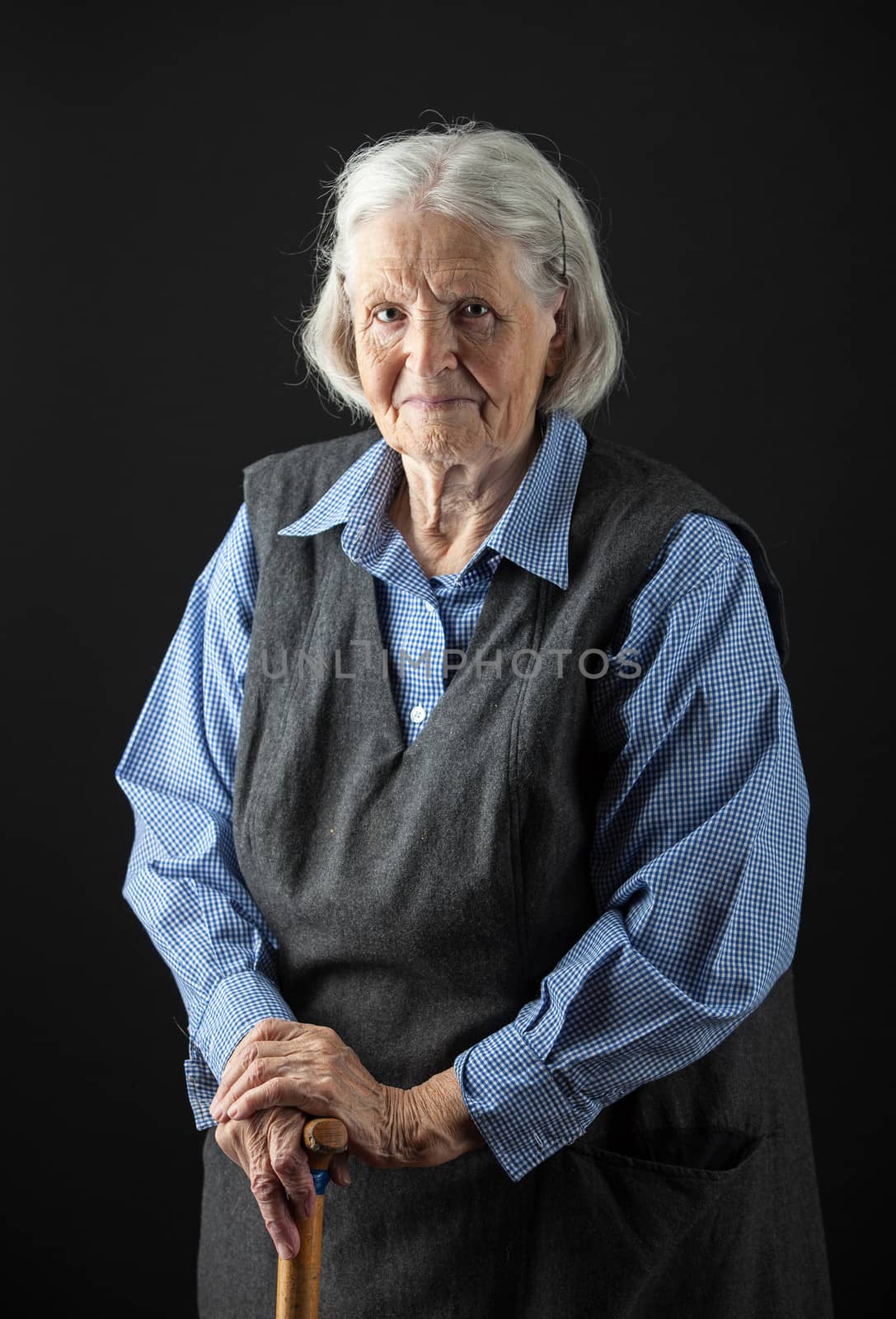 Portrait of a smiling senior woman by photobac