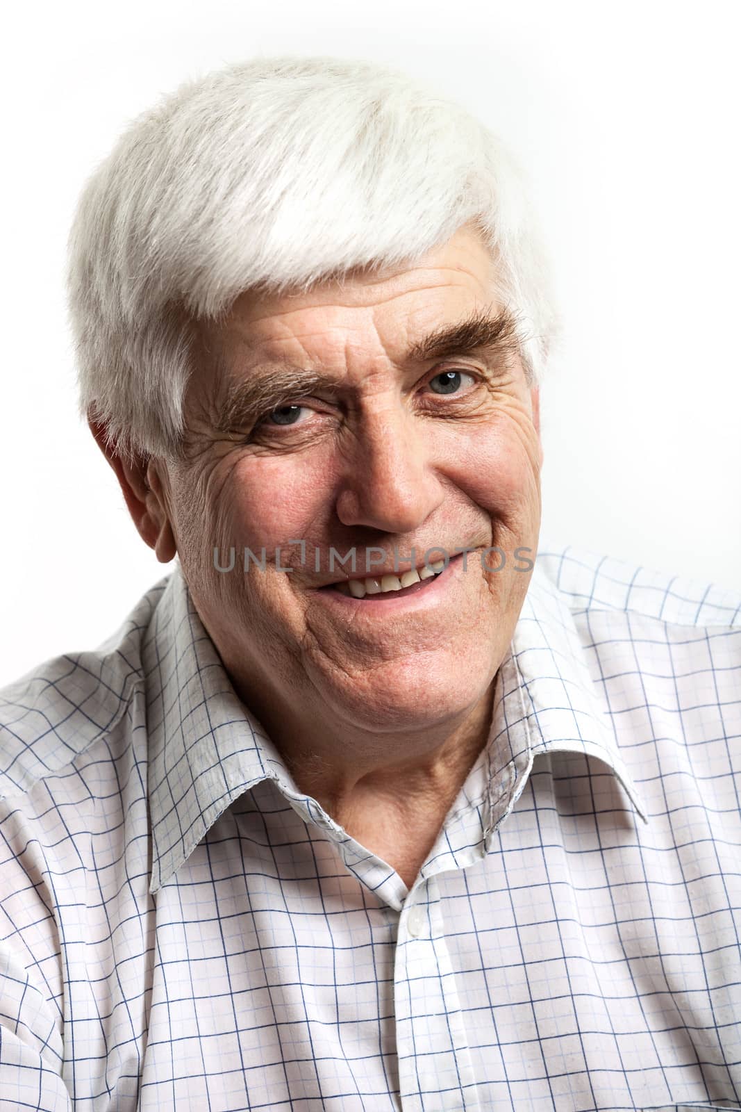 Portrait of handsome mature man looking at camera by photobac