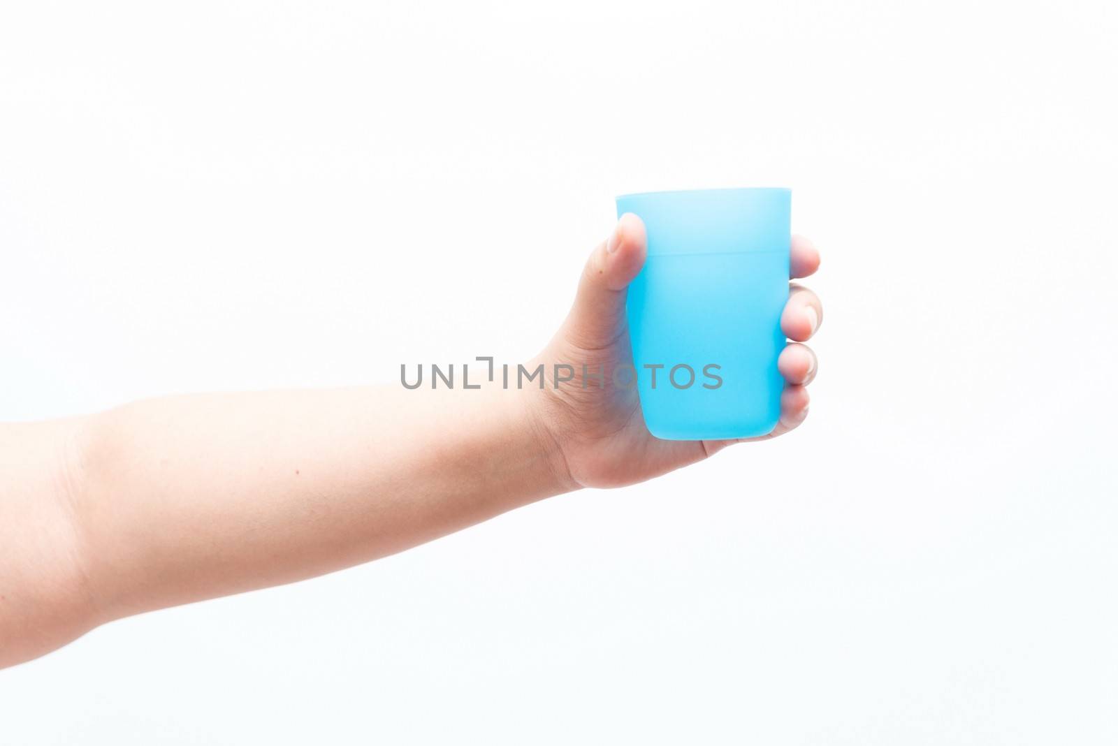 Asian woman holding a small plastic cup by sasilsolutions