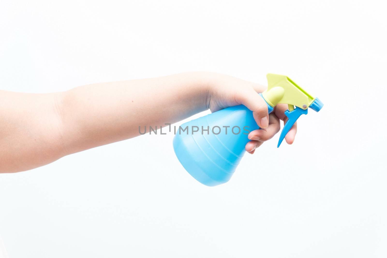 Asian woman holding a water sprayer for ironing by sasilsolutions