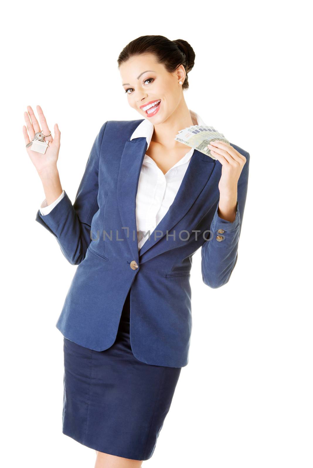 Beautiful young business woman with money and keys. by BDS