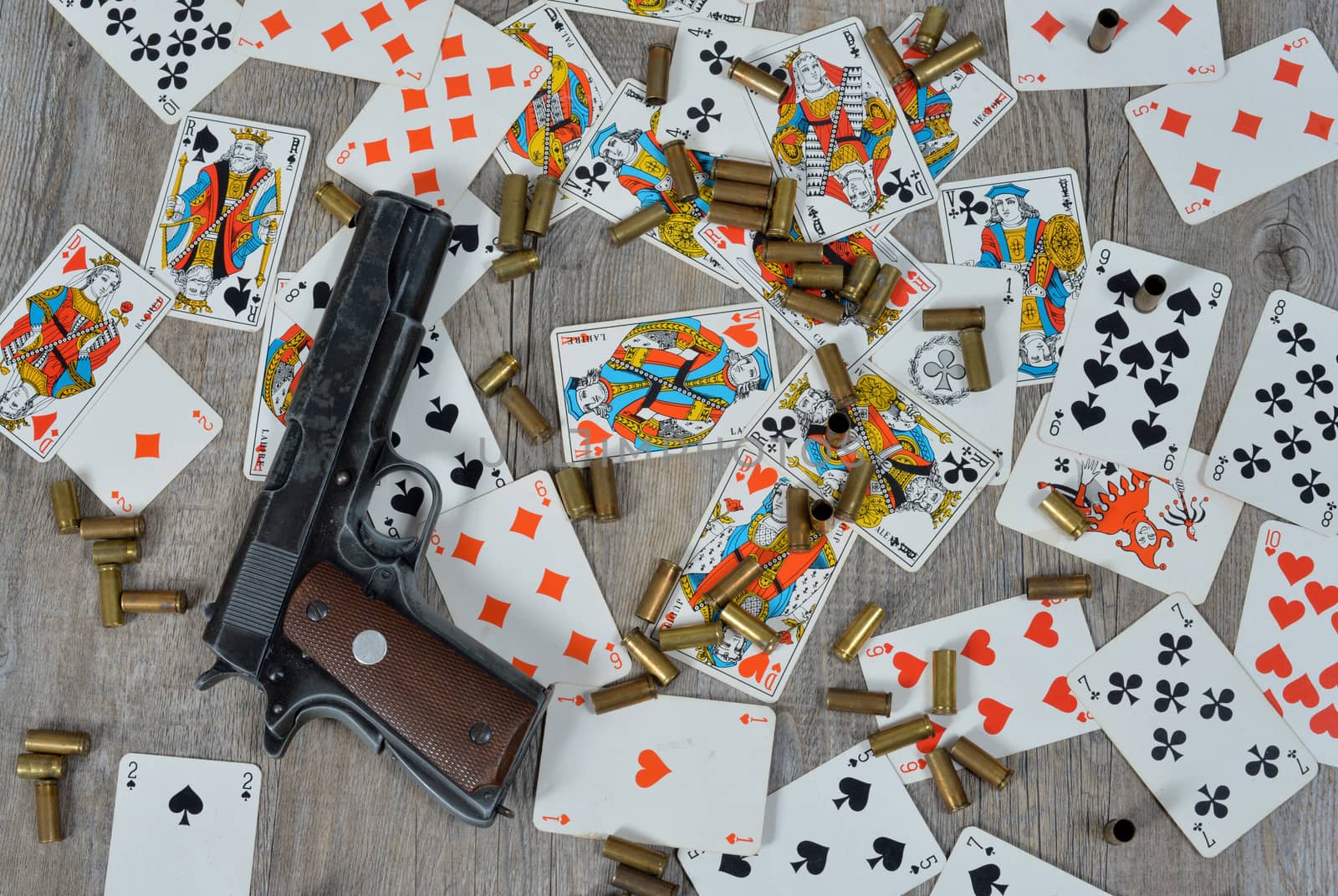 gun with playing cards by philipimage