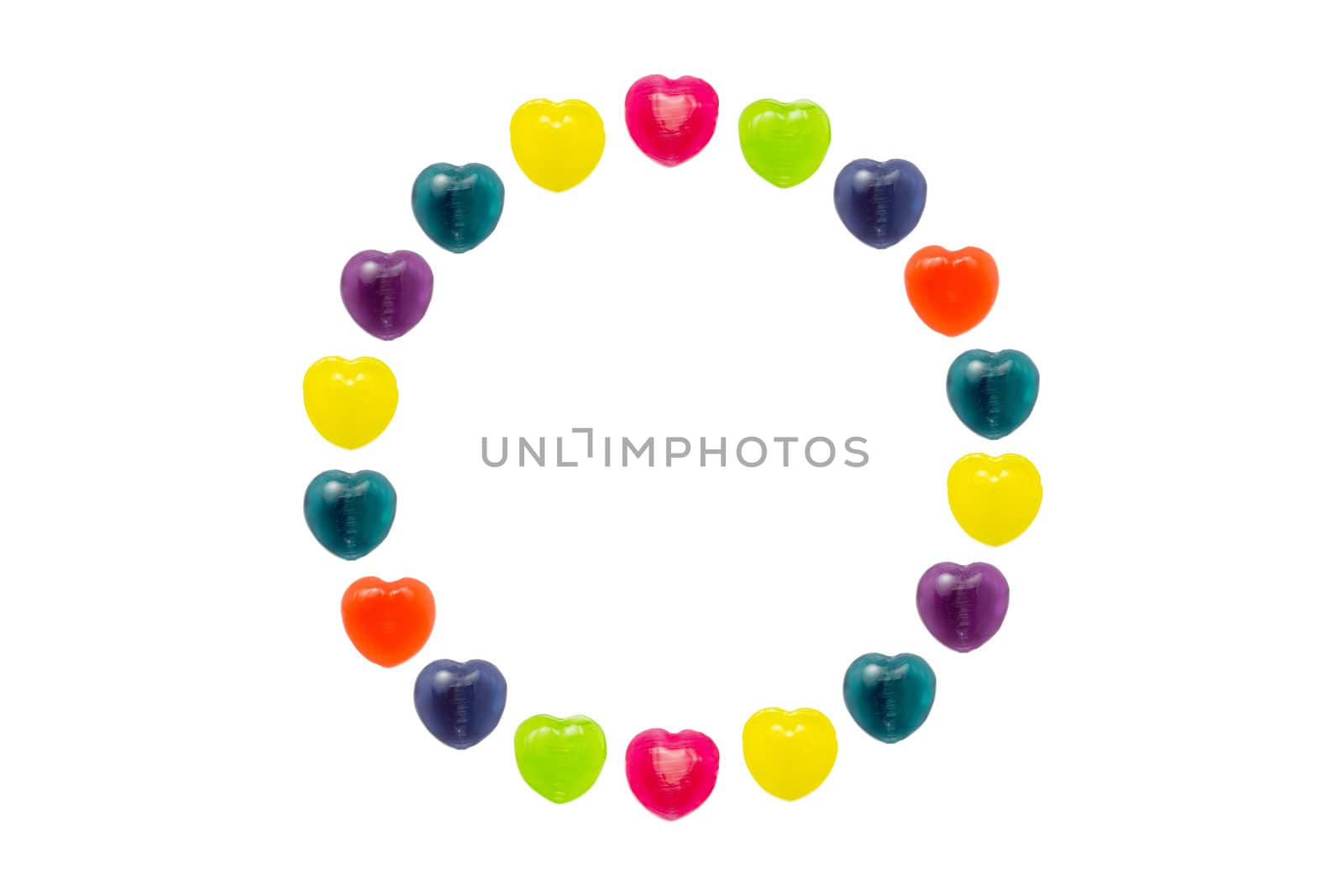 Heart shape confectionery is set in circle style on white background