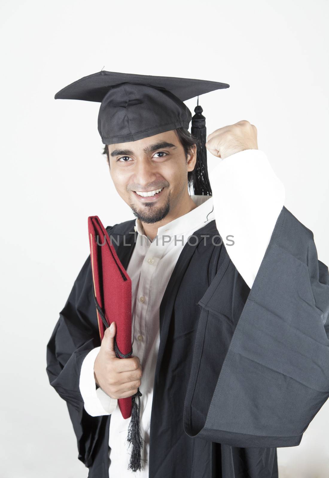 Asian student graduate raising his hand by haiderazim