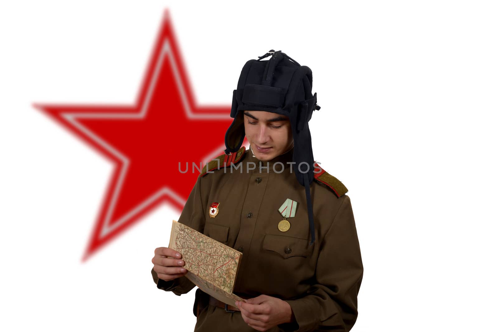 young Soviet tanker look at a map by philipimage