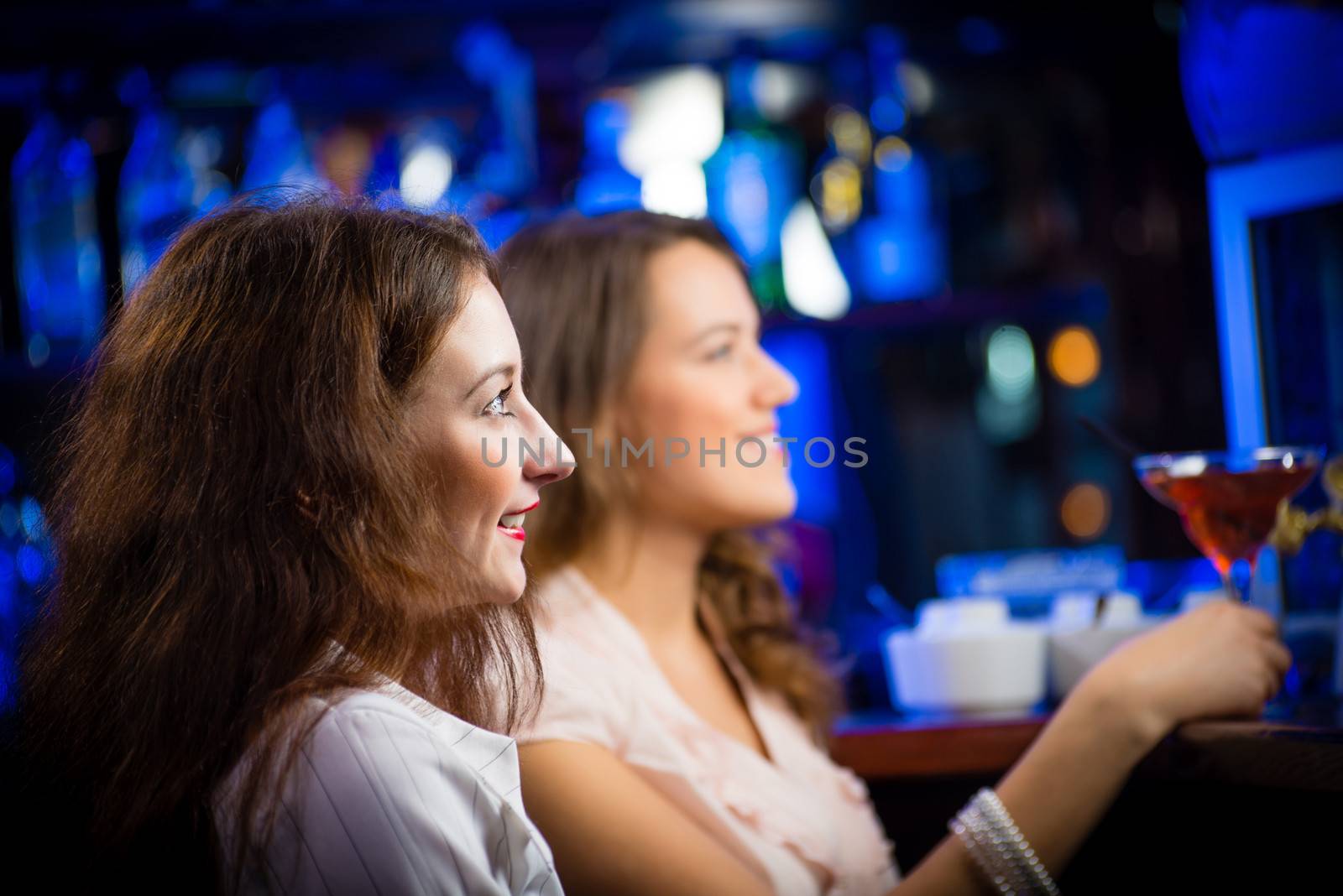 portrait of a young woman in a bar