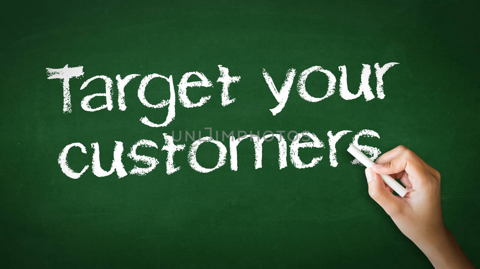 A person drawing and pointing at a Target Your Customers Chalk Illustration